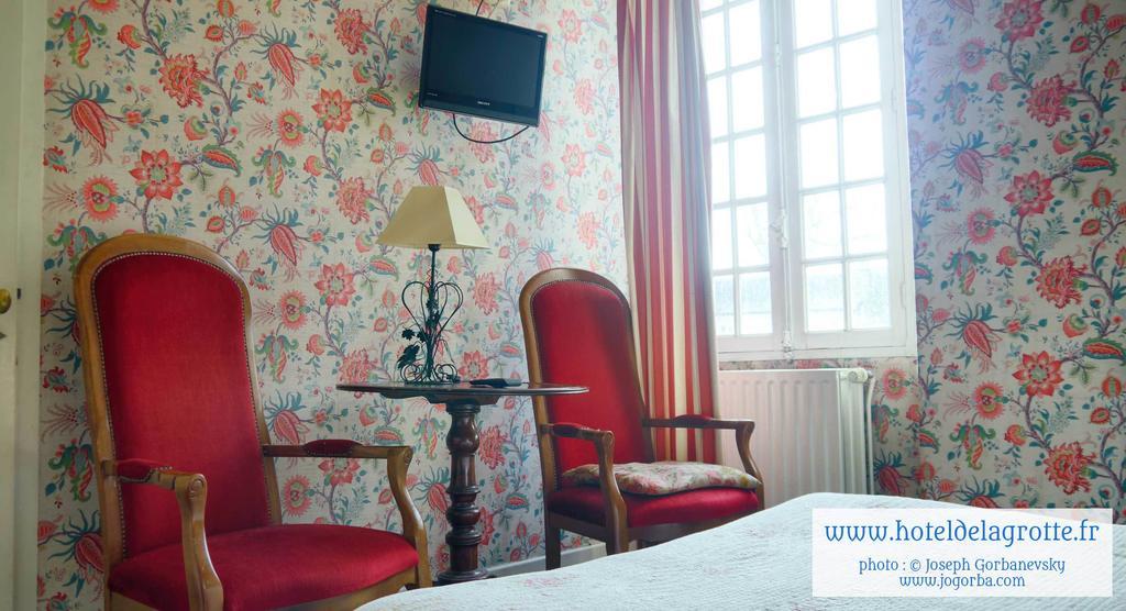 Hotel De La Grotte モンティニャック エクステリア 写真